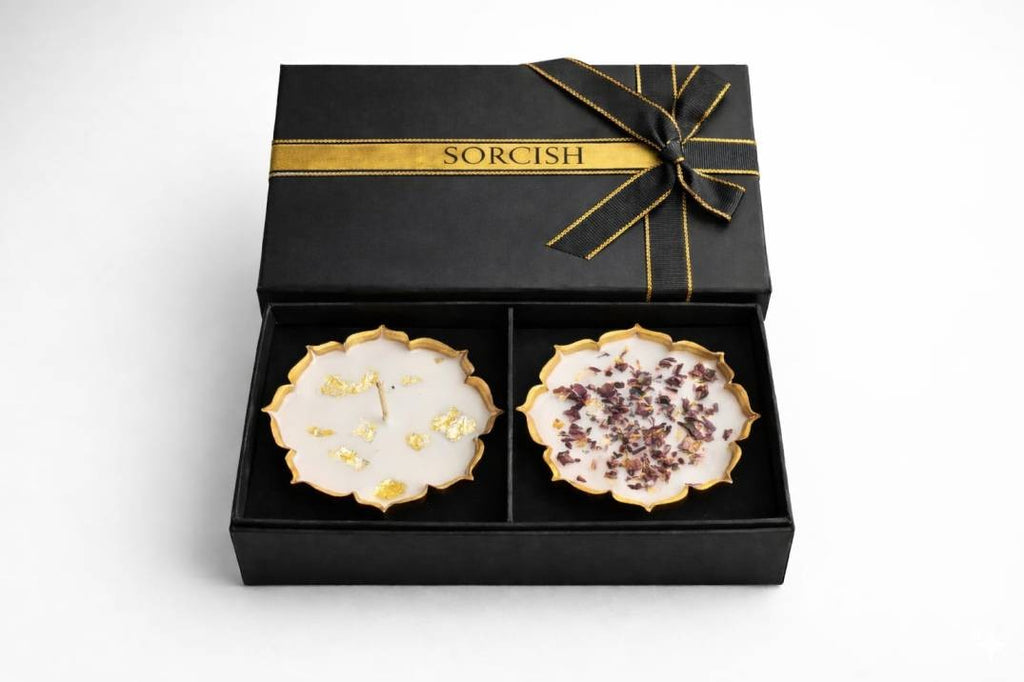 Two decorative plates in a black box with gold ribbon, branded 'Sorcish'.