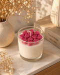 Pink heart-shaped soy wax scented candle